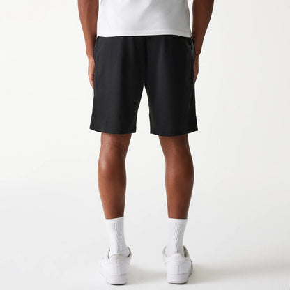 The Male model is wearing New Era Black Mesh Shorts 2