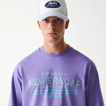 The Male model is wearing New Era Graphic Purple Oversized T-Shirt 7
