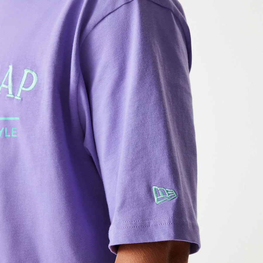The Male model is wearing New Era Graphic Purple Oversized T-Shirt 8