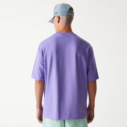 The Male model is wearing New Era Graphic Purple Oversized T-Shirt 2