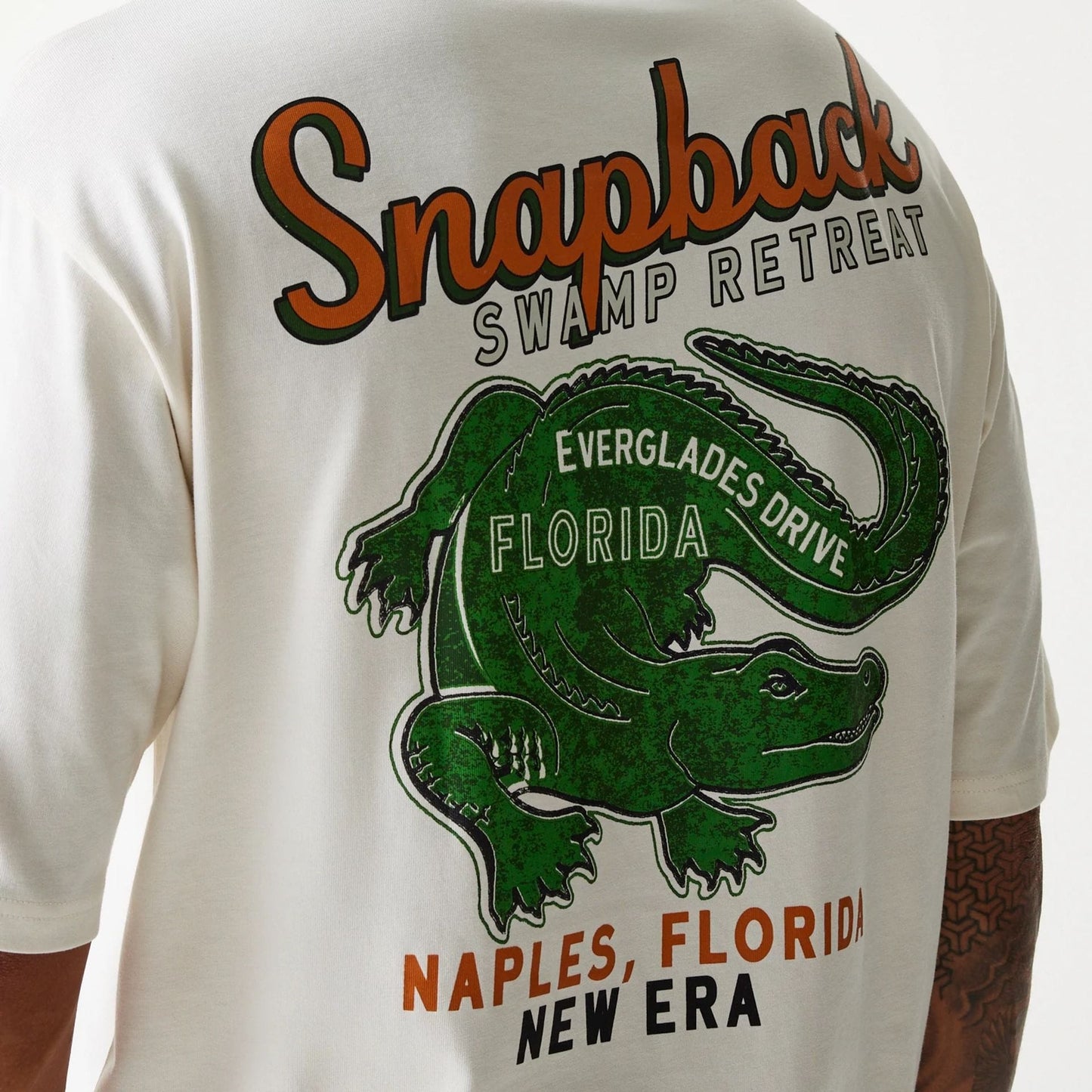 The Male model is wearing New Era Animal Graphic Open White Oversized T-Shirt 4