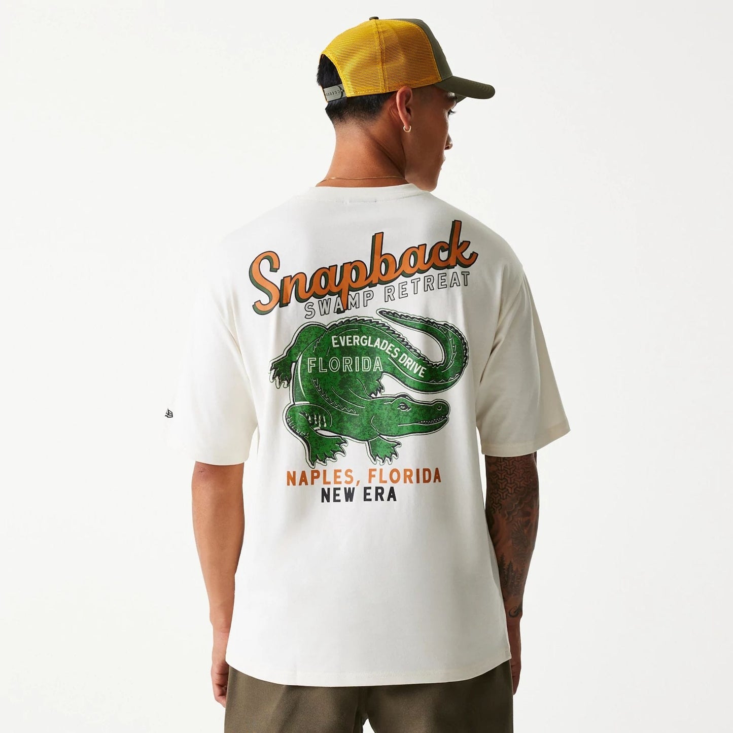 The Male model is wearing New Era Animal Graphic Open White Oversized T-Shirt 2