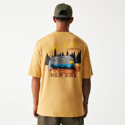 The Male model is wearing New Era Vacation Graphic Beige Oversized T-Shirt 2