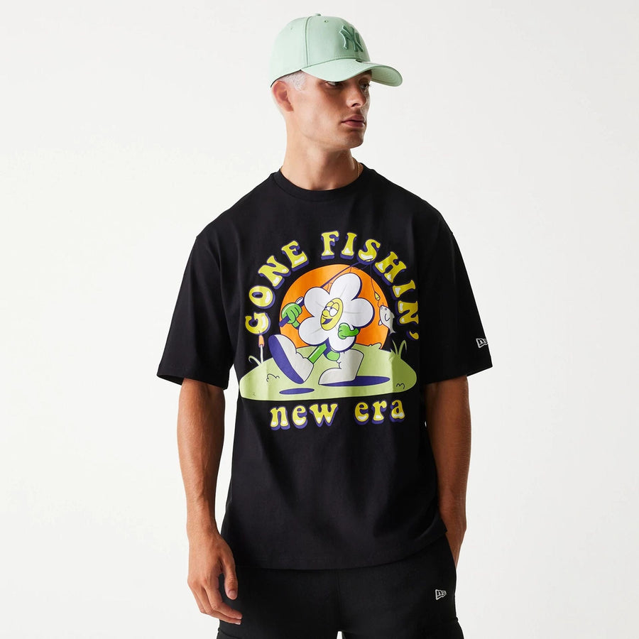 The Male model is wearing New Era Outdoor Graphic Black Oversized T-Shirt 3