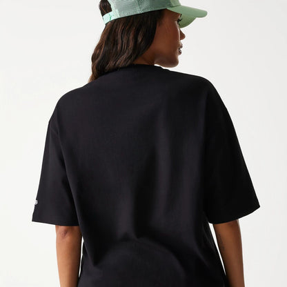 The Male model is wearing New Era Outdoor Graphic Black Oversized T-Shirt 8