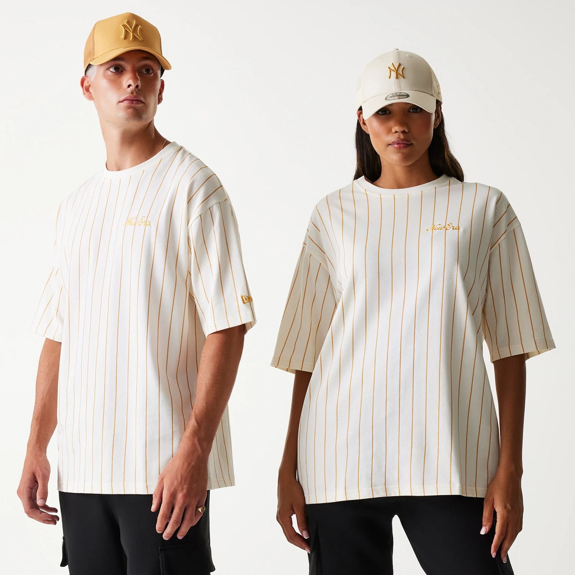 The Male model is wearing New Era Pinstripe Open White Oversized T-Shirt 1