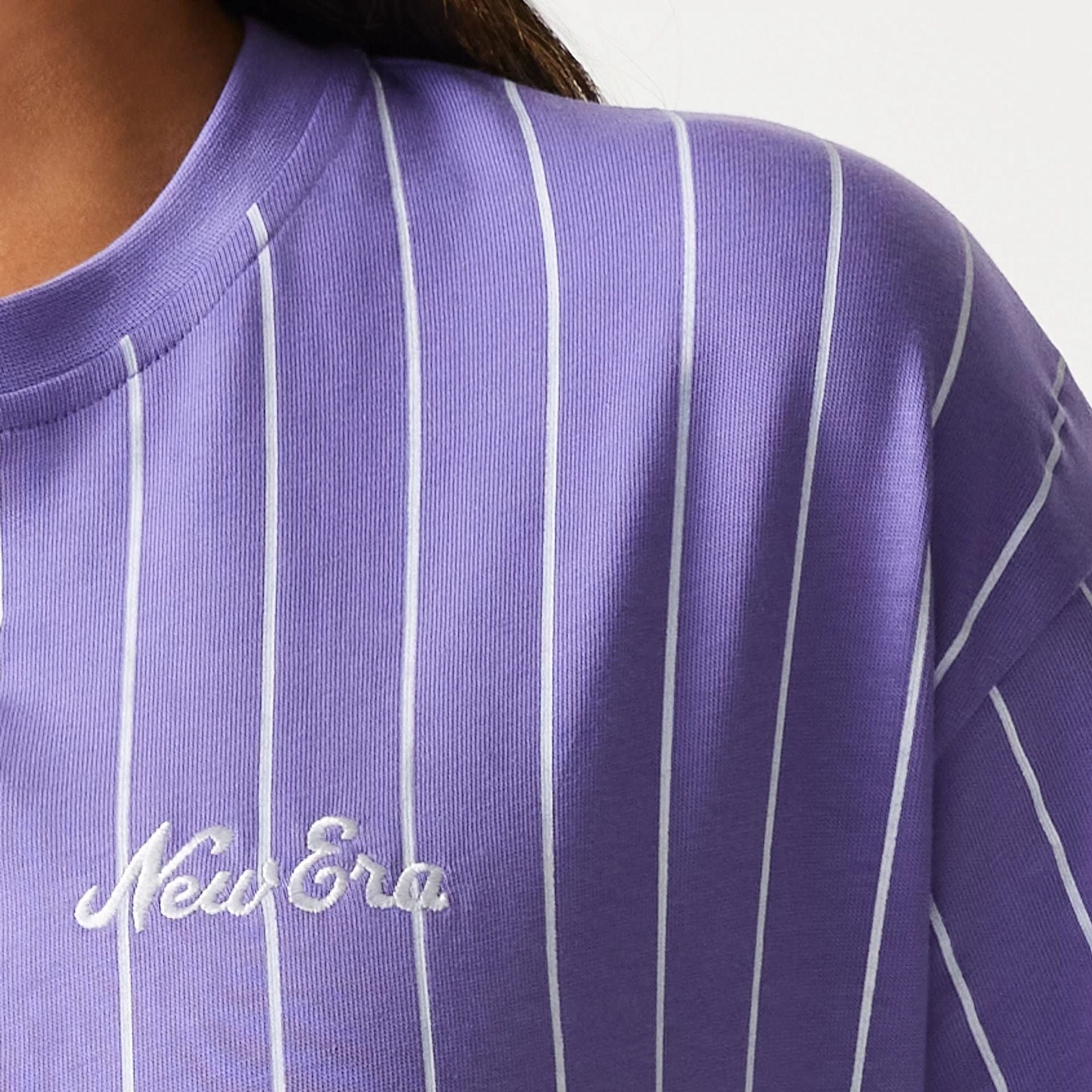 The Male model is wearing New Era Pinstripe Purple Oversized T-Shirt 7