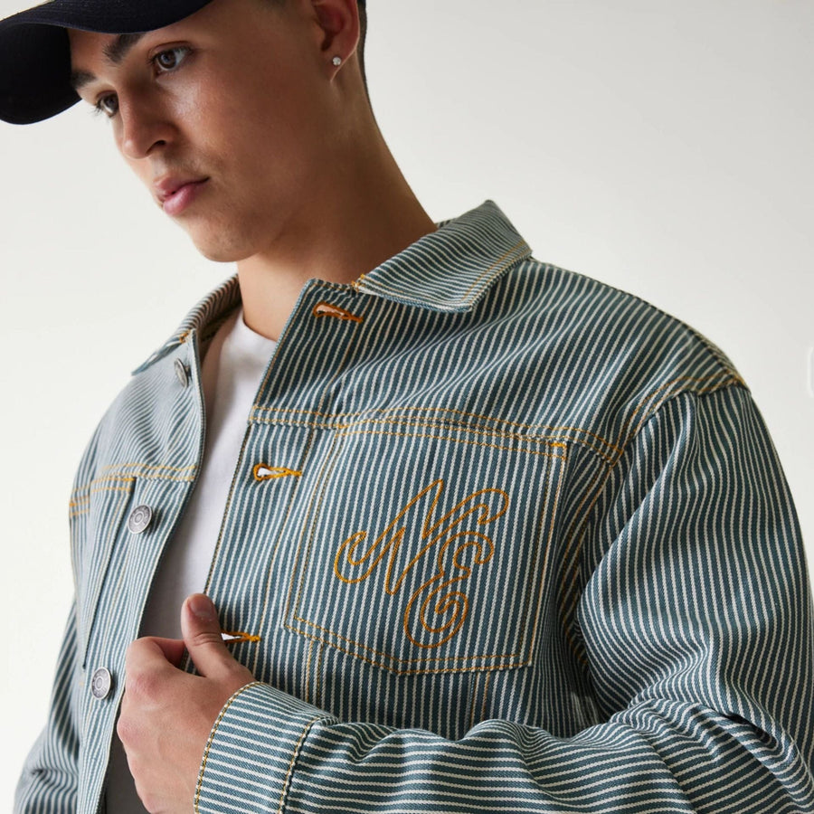 The Male model is wearing New Era Blue Denim Jacket 4