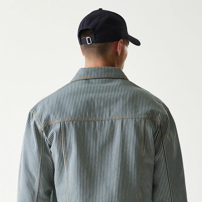 The Male model is wearing New Era Blue Denim Jacket 8