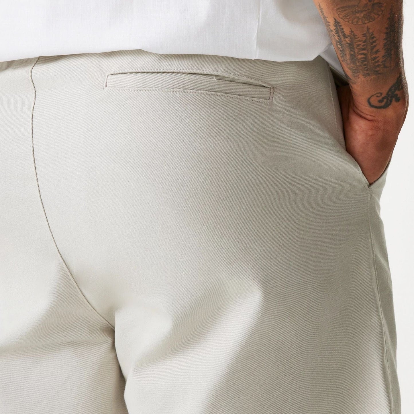 The Male model is wearing New Era Cream Chino Shorts 7