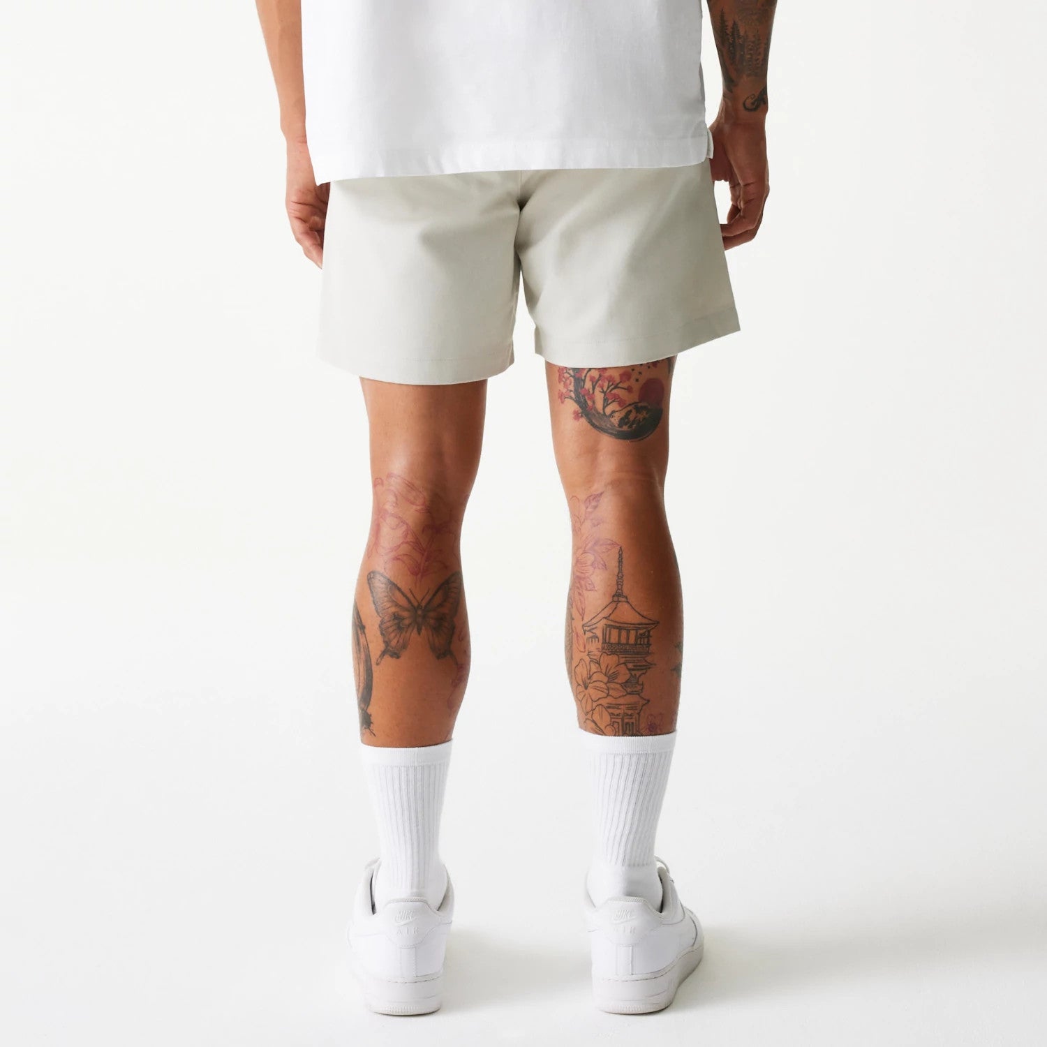 The Male model is wearing New Era Cream Chino Shorts 2