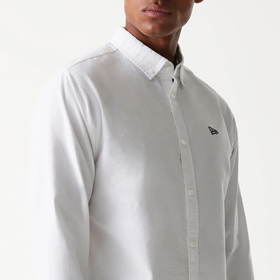 The Male model is wearing New Era White Long Sleeve Shirt 3
