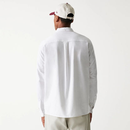 The Male model is wearing New Era White Long Sleeve Shirt 2