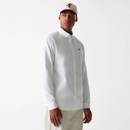 The Male model is wearing New Era White Long Sleeve Shirt 1