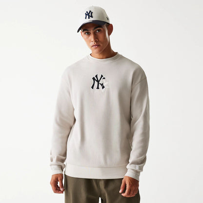 The Male model is wearing New York Yankees MLB Waffle Cream Oversized Crew Neck Sweater 1