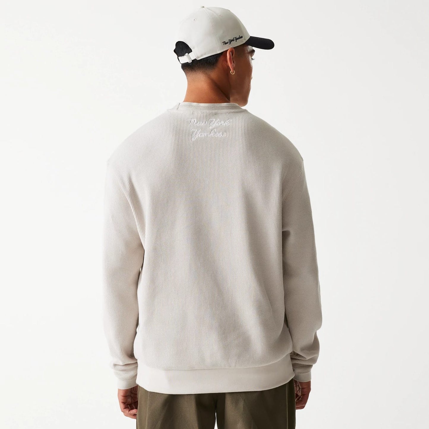 The Male model is wearing New York Yankees MLB Waffle Cream Oversized Crew Neck Sweater 2