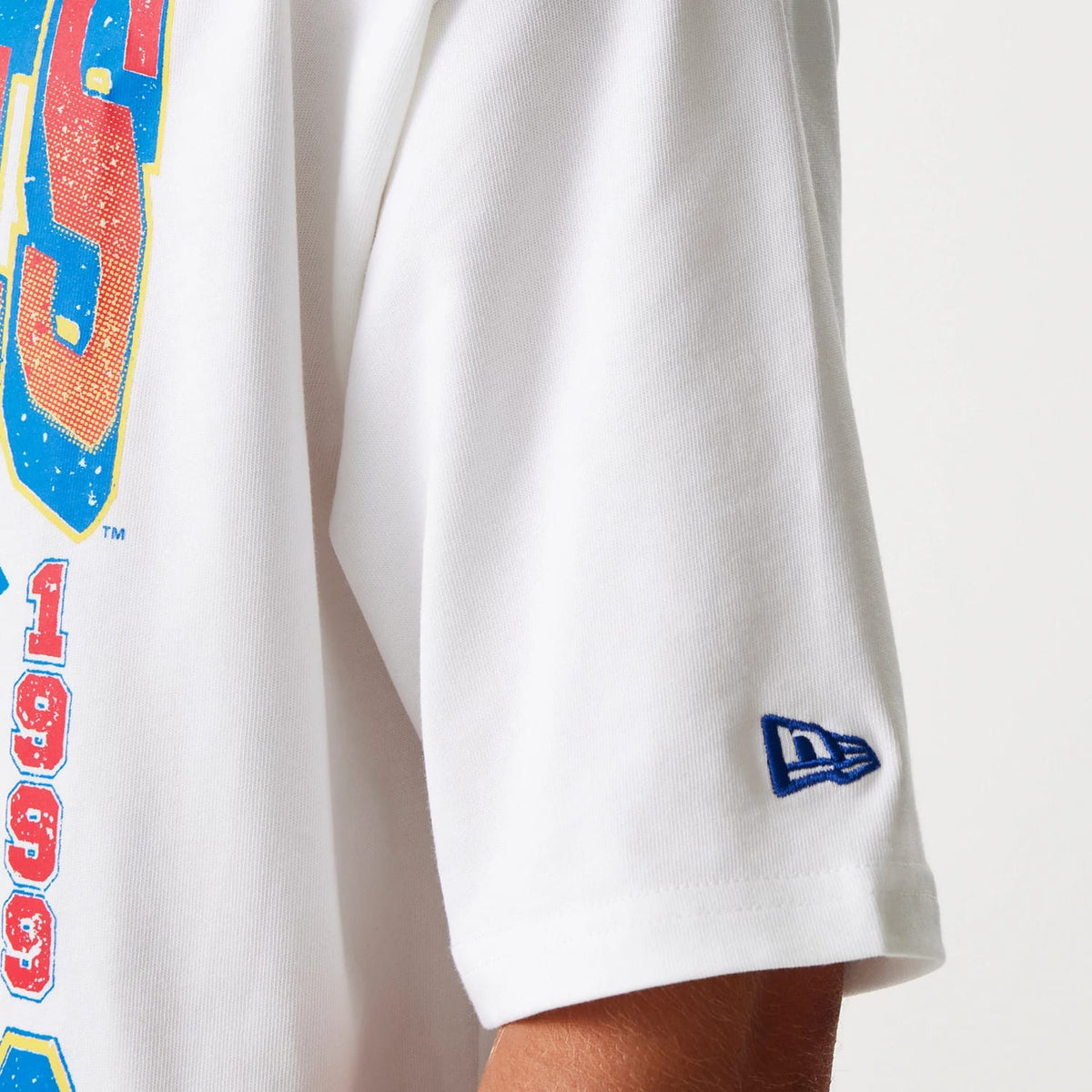 The Male model is wearing New York Yankees MLB World Series 1999 White Oversized T-Shirt 7