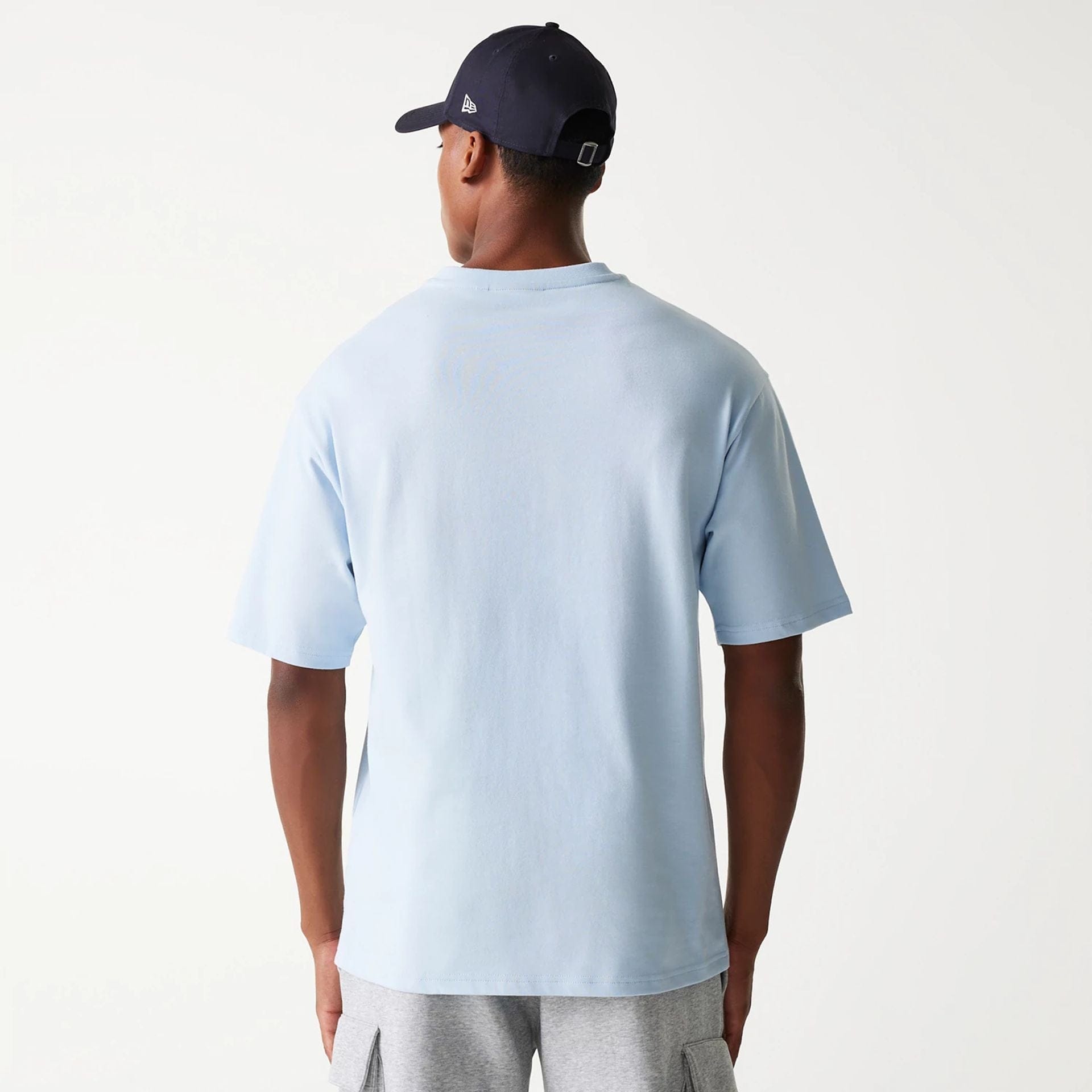 The Male model is wearing New York Yankees MLB World Series Pastel Blue Oversized T-Shirt 2