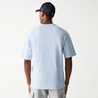 The Male model is wearing New York Yankees MLB World Series Pastel Blue Oversized T-Shirt 2