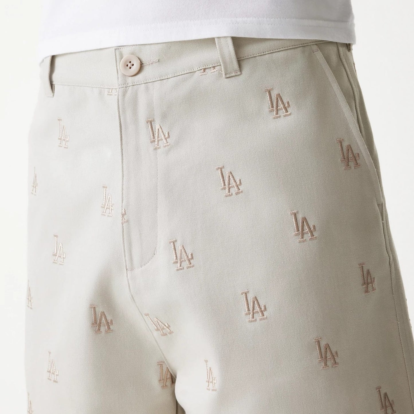 The Male model is wearing LA Dodgers MLB Monogram Cream Shorts 6