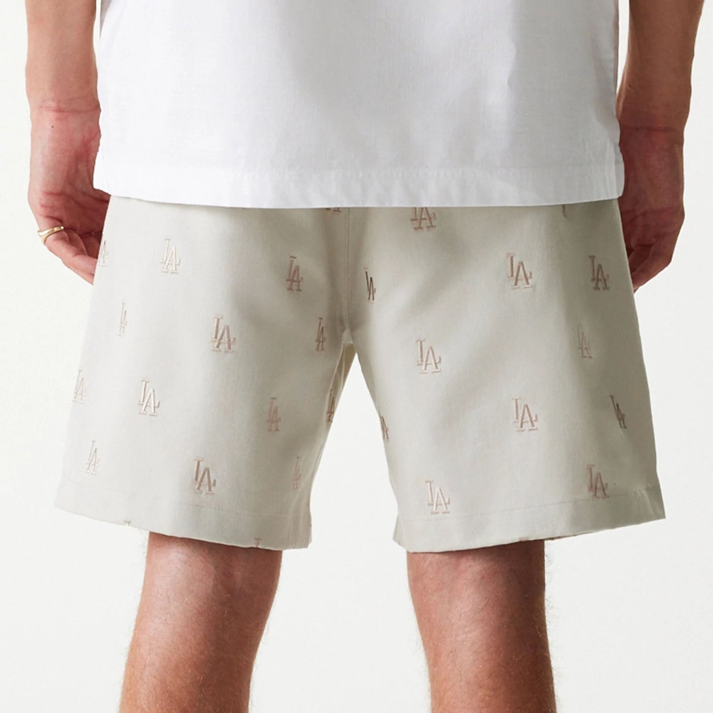 The Male model is wearing LA Dodgers MLB Monogram Cream Shorts 7
