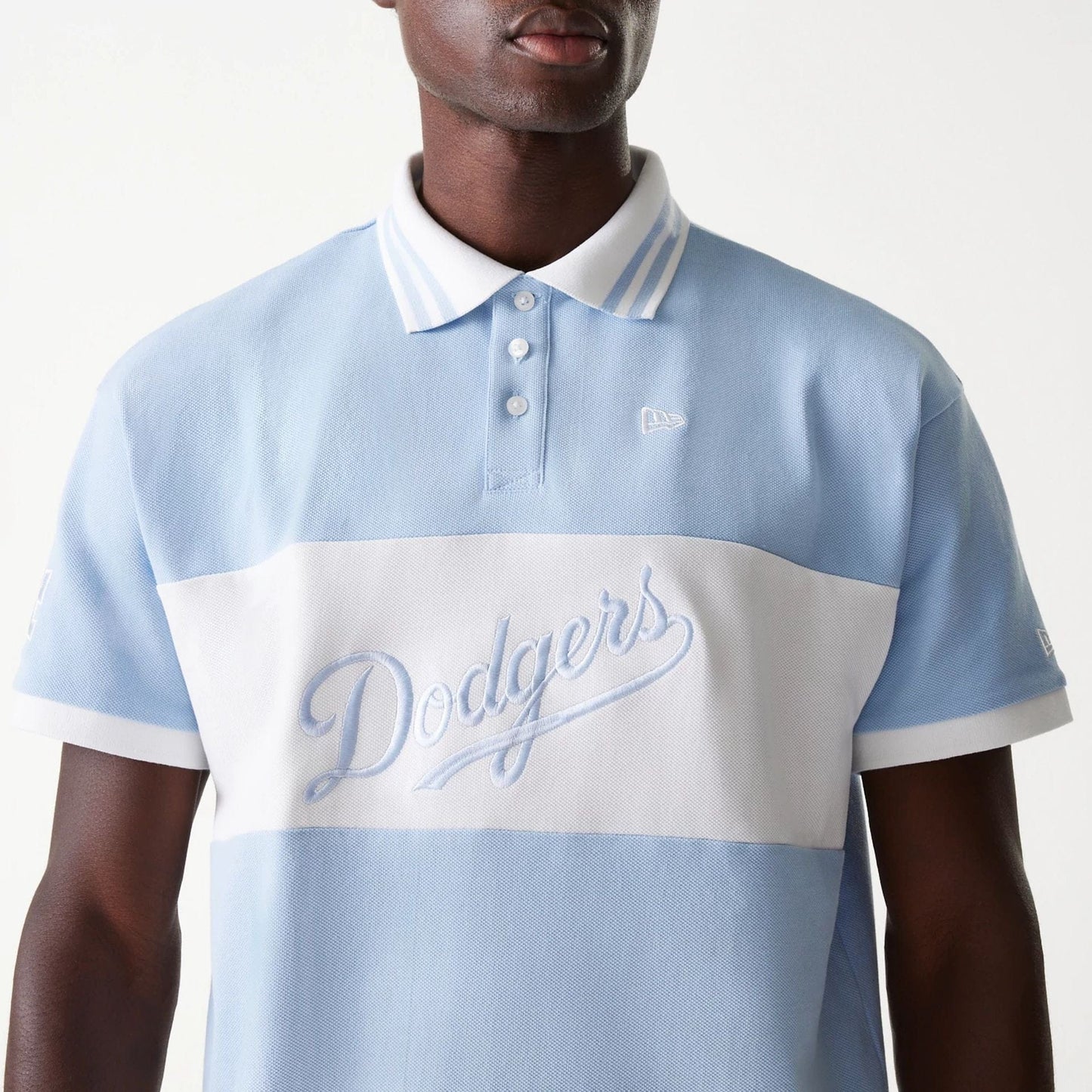 The Male model is wearing LA Dodgers MLB Graphic Pastel Blue Polo Shirt 3