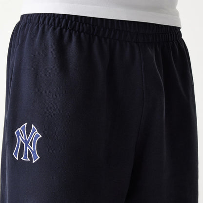 The Male model is wearing New York Yankees MLB Pique Navy Shorts 4