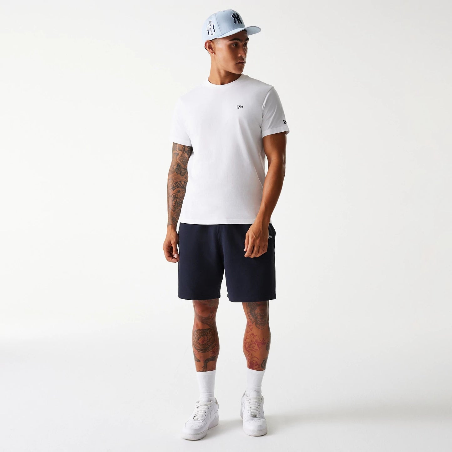 The Male model is wearing New York Yankees MLB Pique Navy Shorts 7
