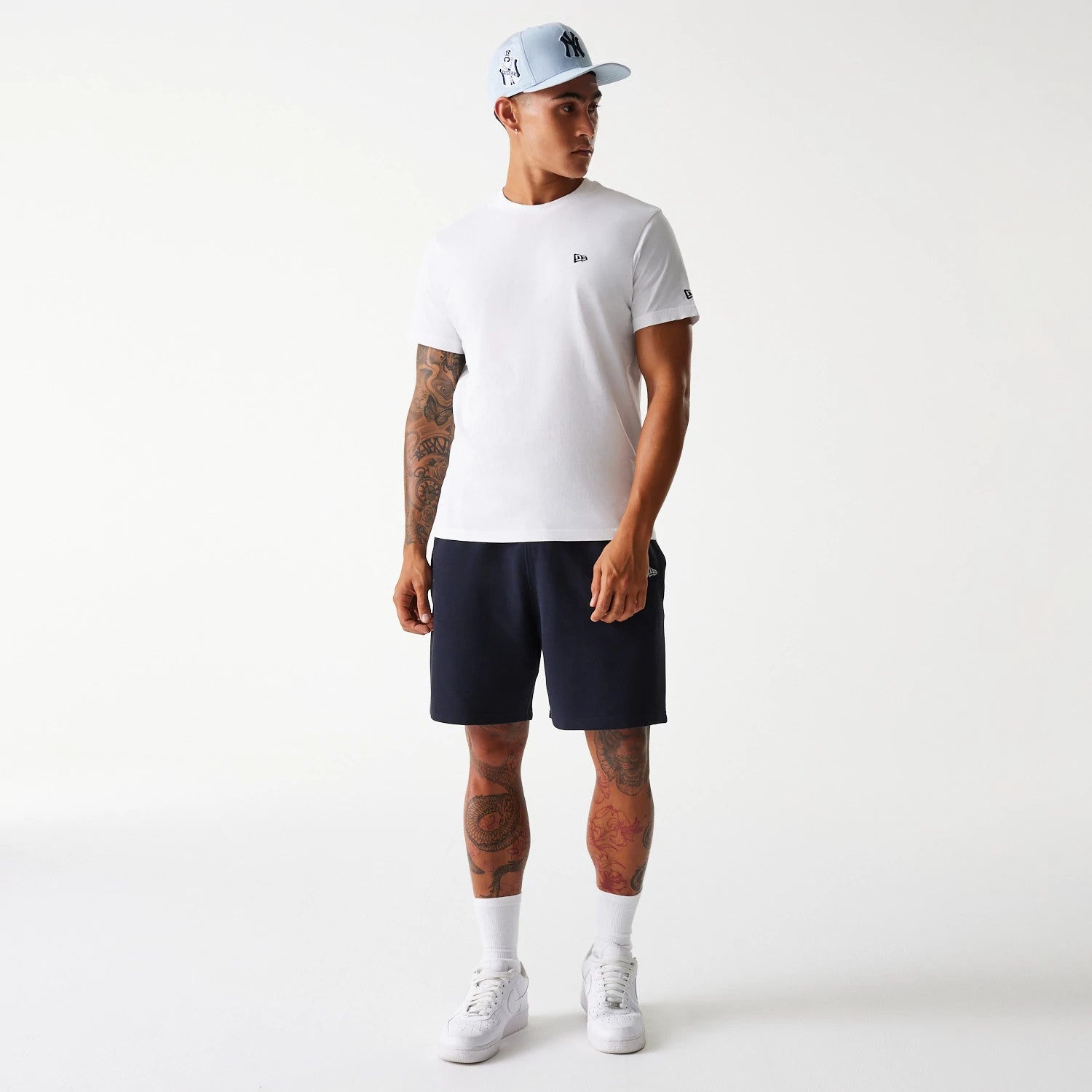 The Male model is wearing New York Yankees MLB Pique Navy Shorts 7