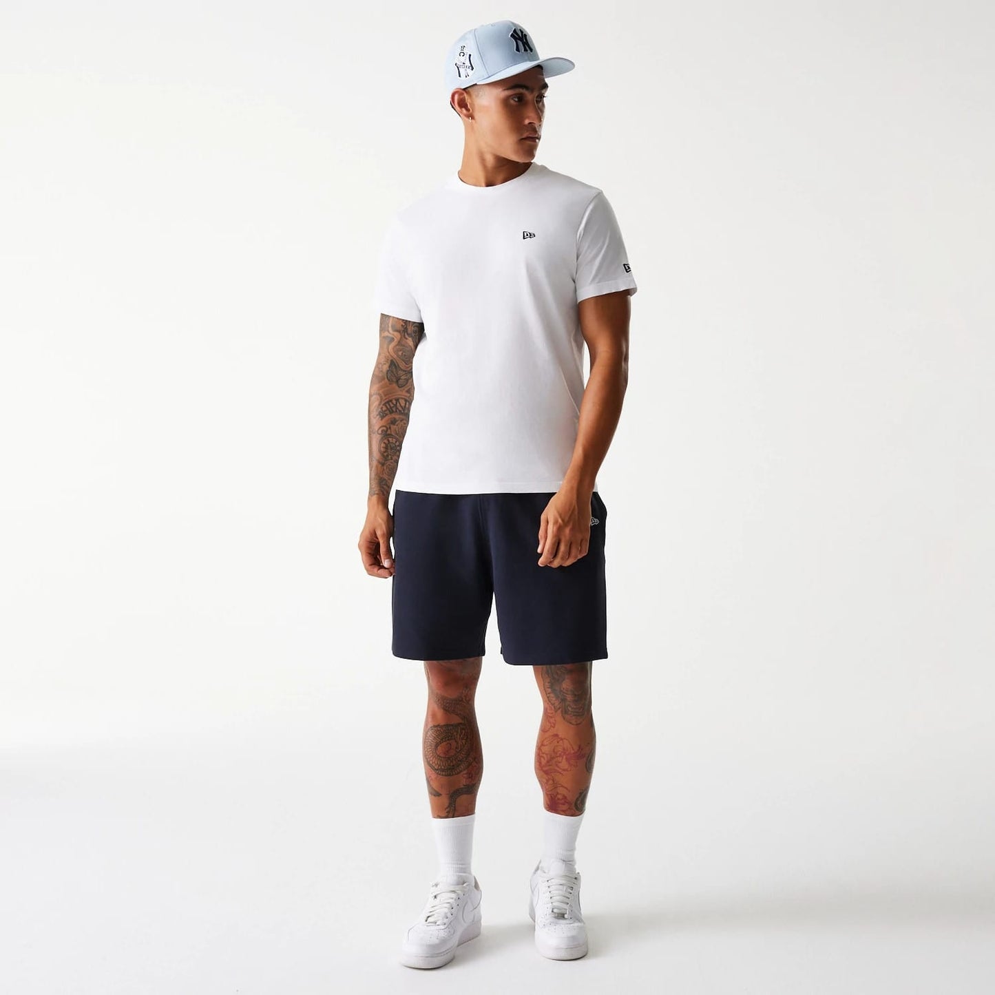 The Male model is wearing New York Yankees MLB Pique Navy Shorts 7