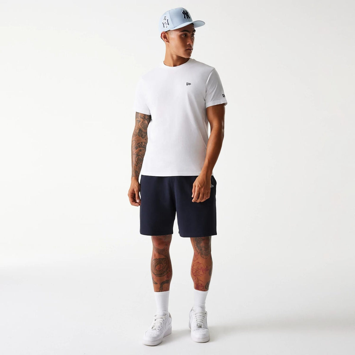 The Male model is wearing New York Yankees MLB Pique Navy Shorts 7