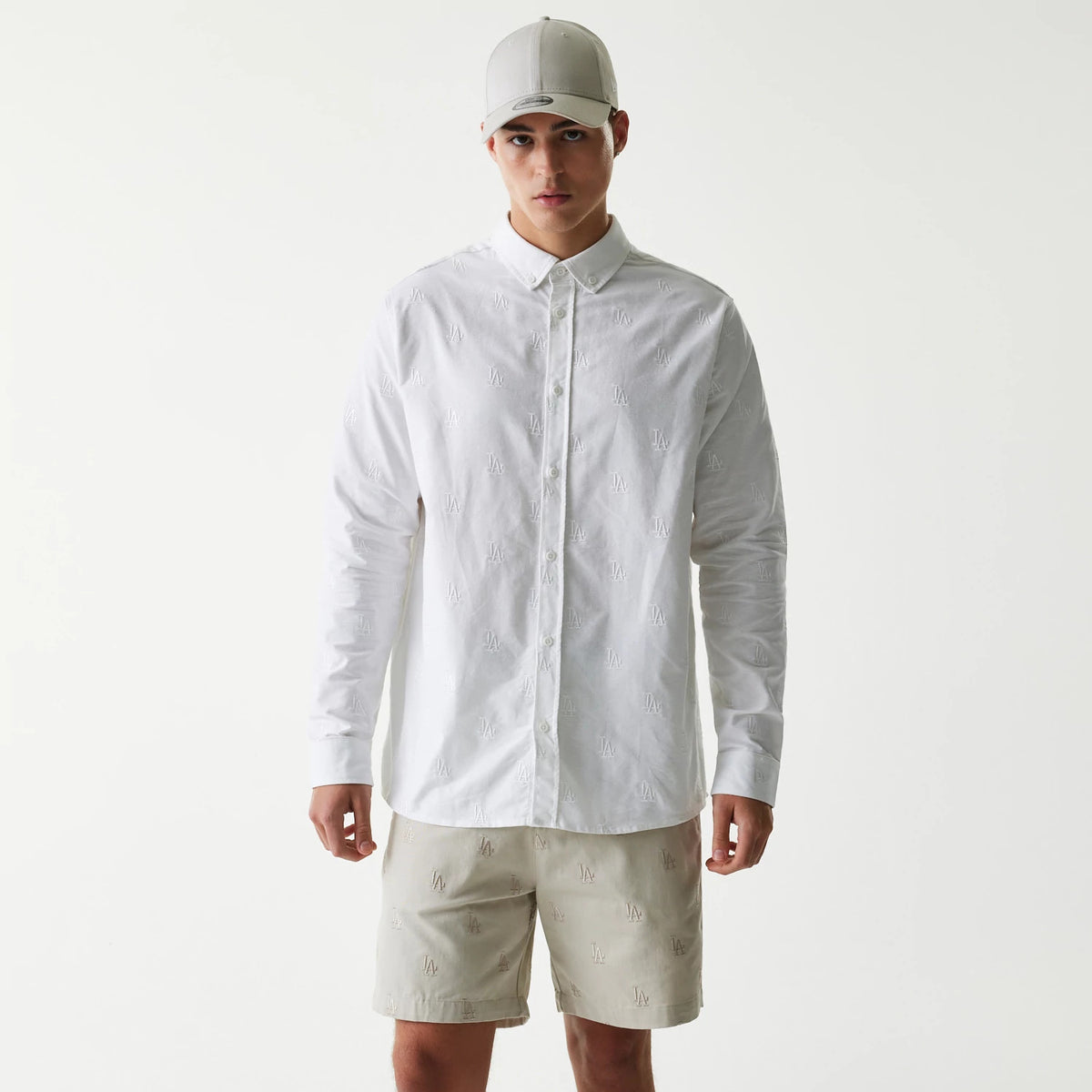 The Male model is wearing LA Dodgers MLB Monogram White Long Sleeve Shirt 1