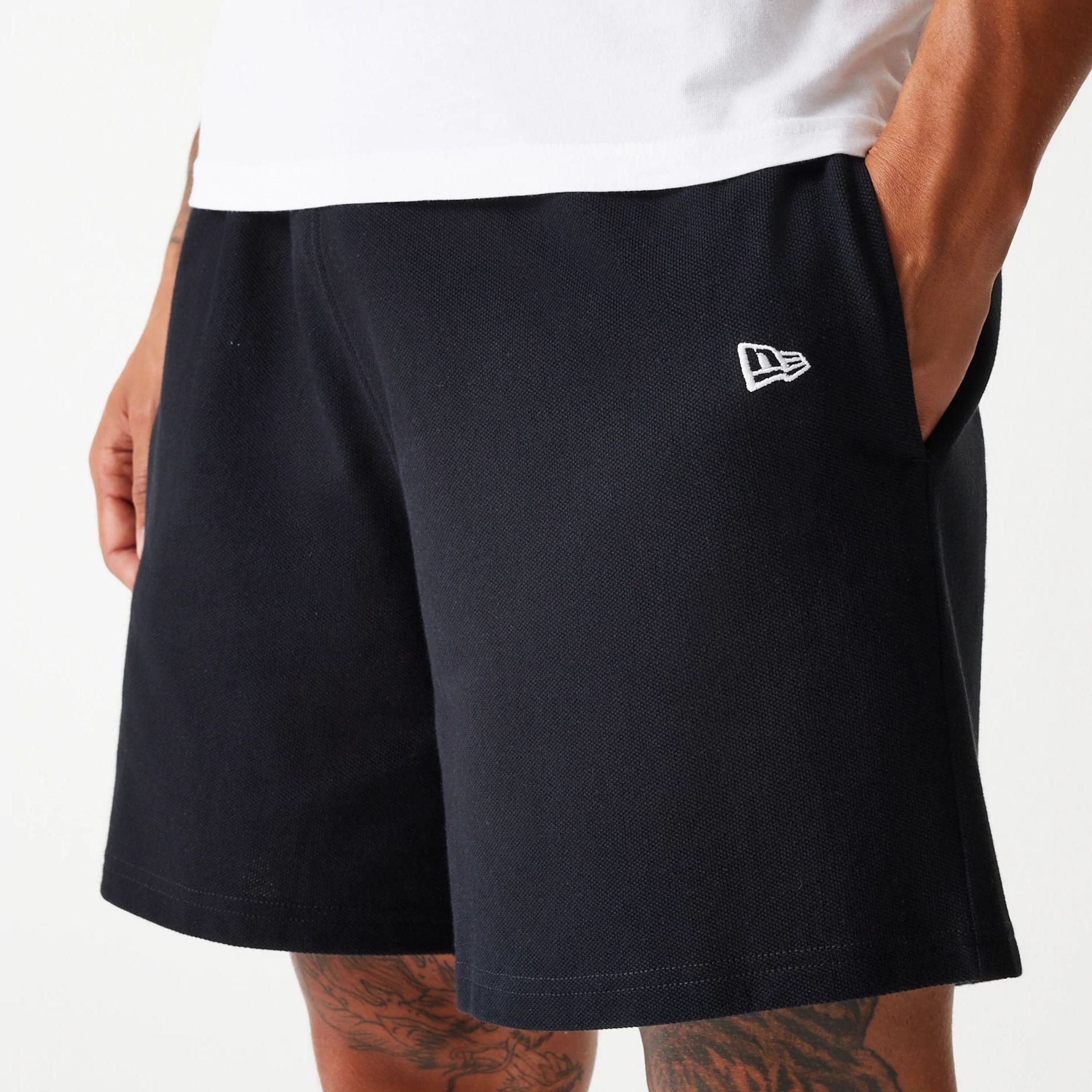 The Male model is wearing LA Dodgers MLB Pique Black Shorts 3
