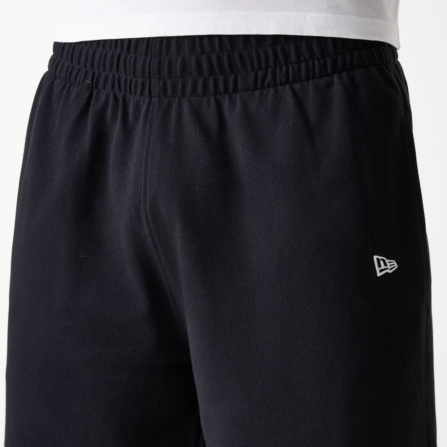 The Male model is wearing LA Dodgers MLB Pique Black Shorts 5
