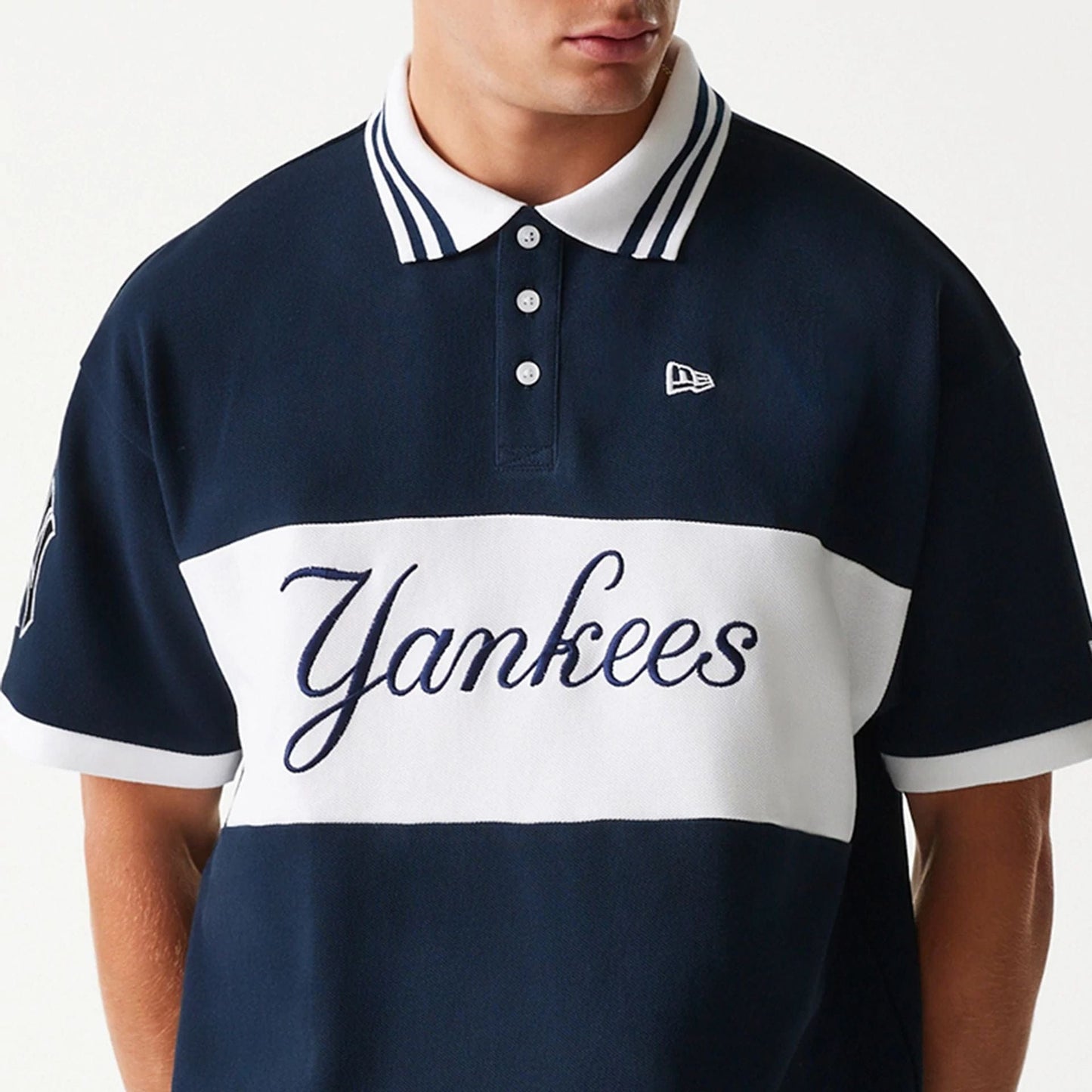 The Male model is wearing New York Yankees MLB Graphic Navy Polo Shirt 3
