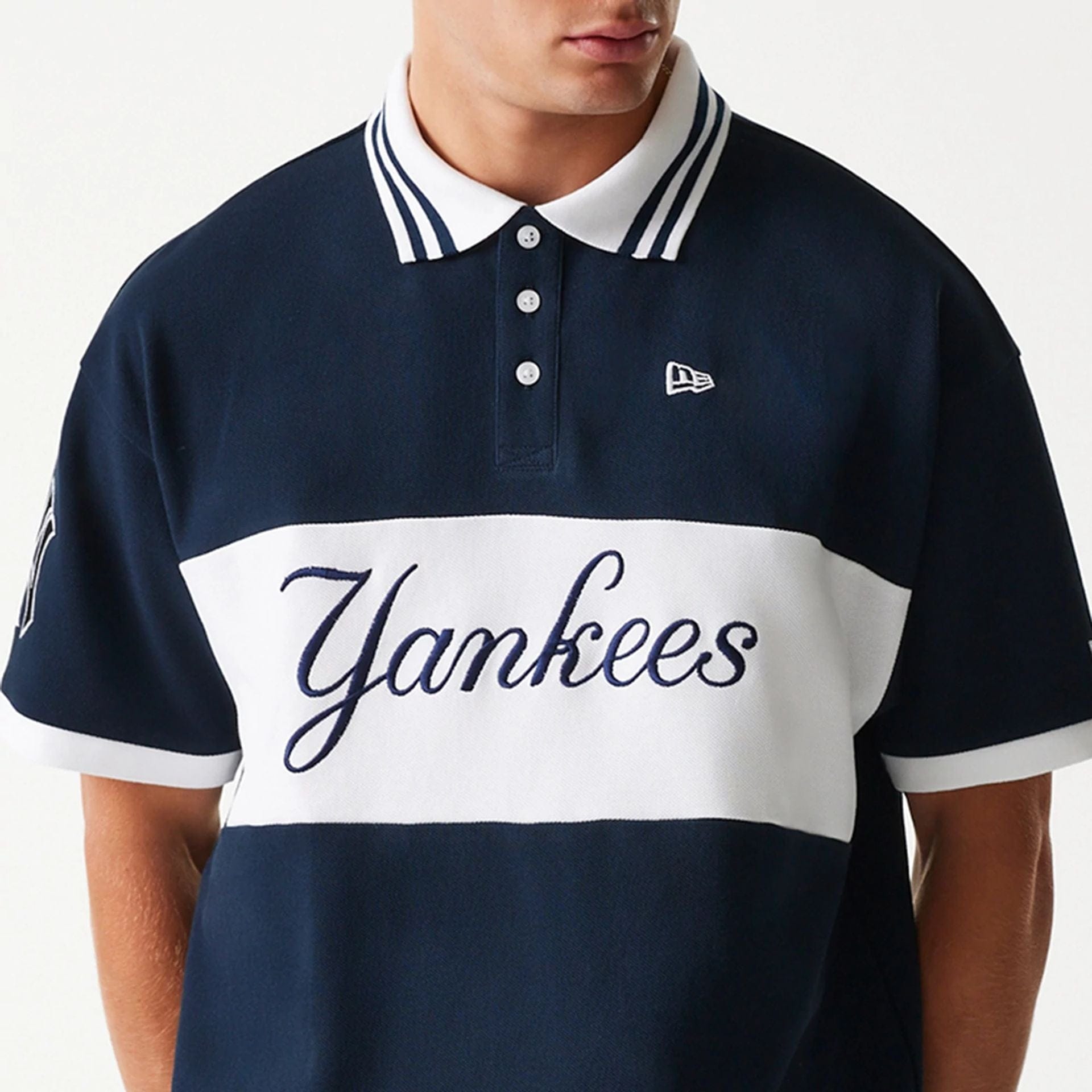 The Male model is wearing New York Yankees MLB Graphic Navy Polo Shirt 3