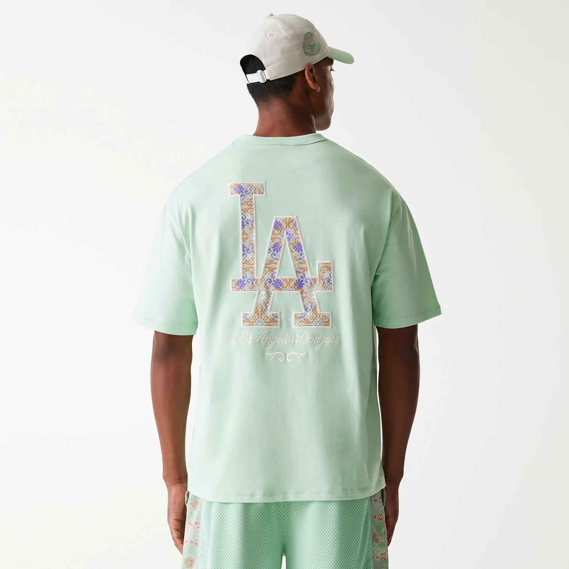 The Male model is wearing LA Dodgers MLB Infill Pastel Green Oversized T-Shirt 2