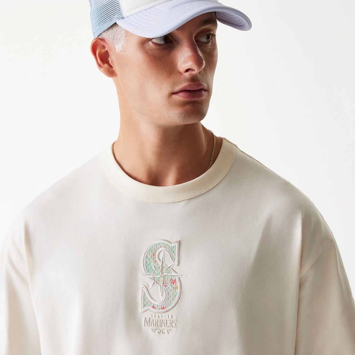 The Male model is wearing Seattle Mariners MLB Infill Open White Oversized T-Shirt 5