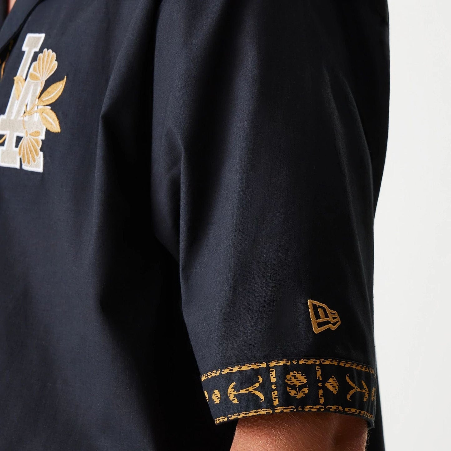 The Male model is wearing LA Dodgers MLB Taping Black Short Sleeve Shirt 6