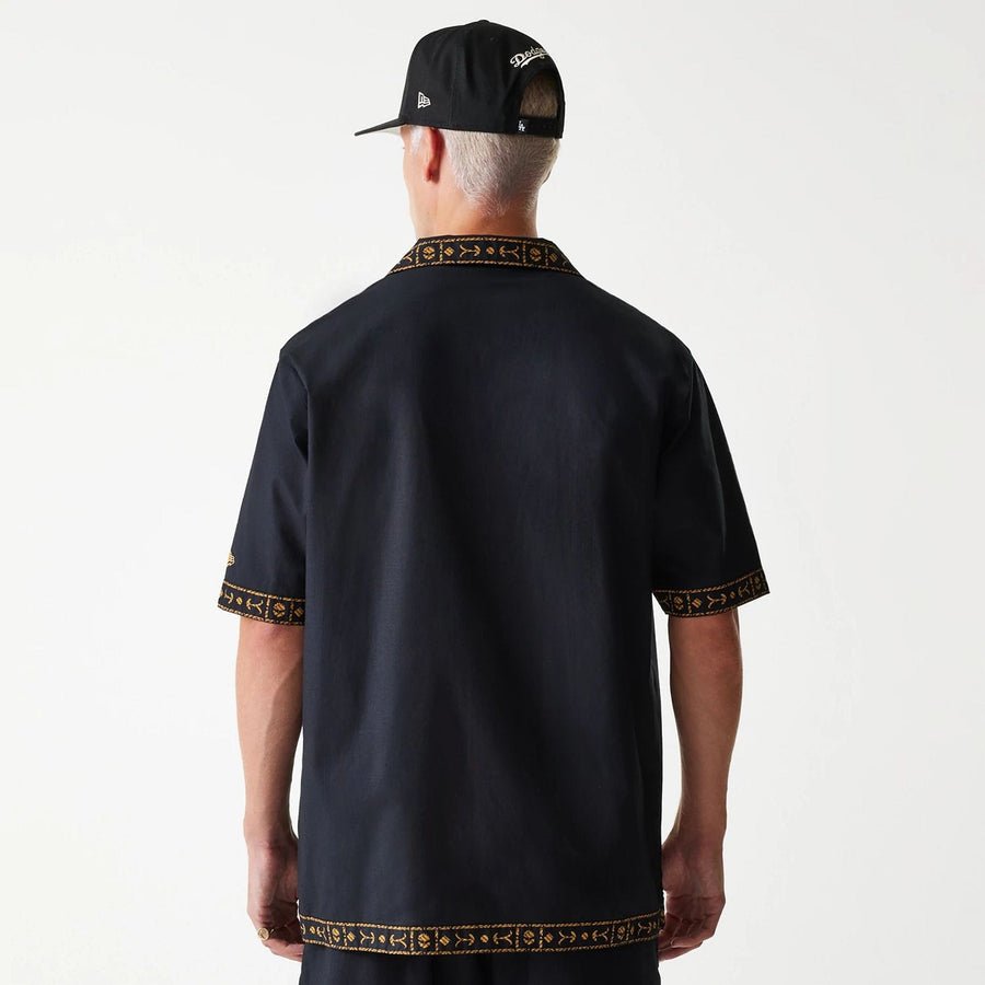 The Male model is wearing LA Dodgers MLB Taping Black Short Sleeve Shirt 2