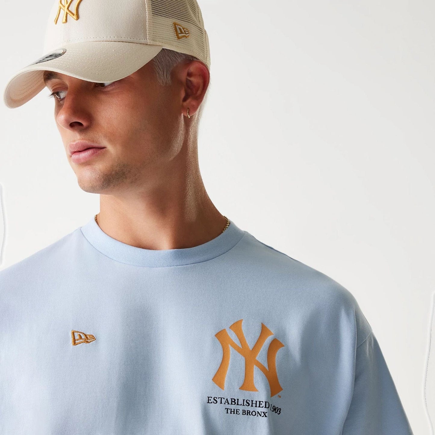 The Male model is wearing New York Yankees MLB Baseball Graphic Pastel Blue Oversized T-Shirt 6
