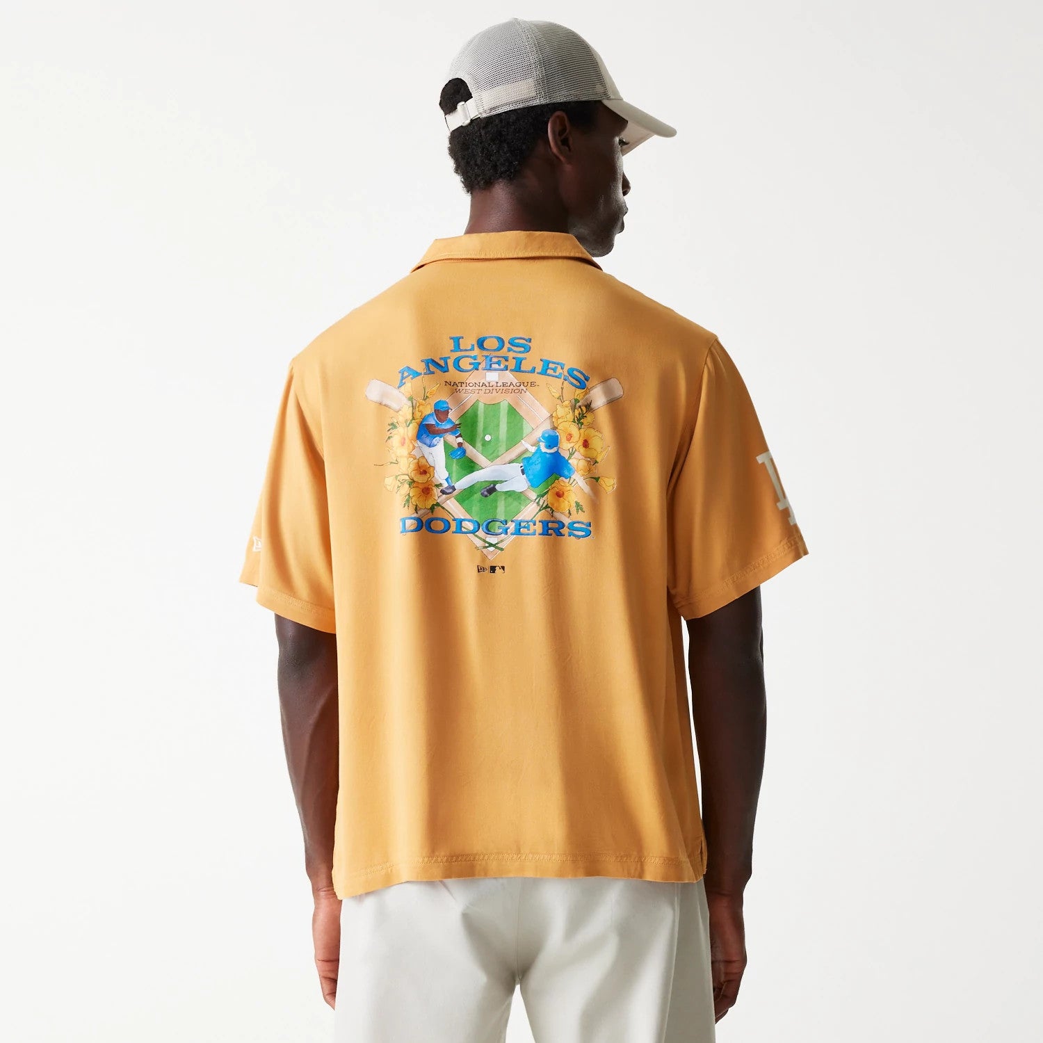 The Male model is wearing LA Dodgers MLB Graphic Beige Revere Short Sleeve Shirt 2