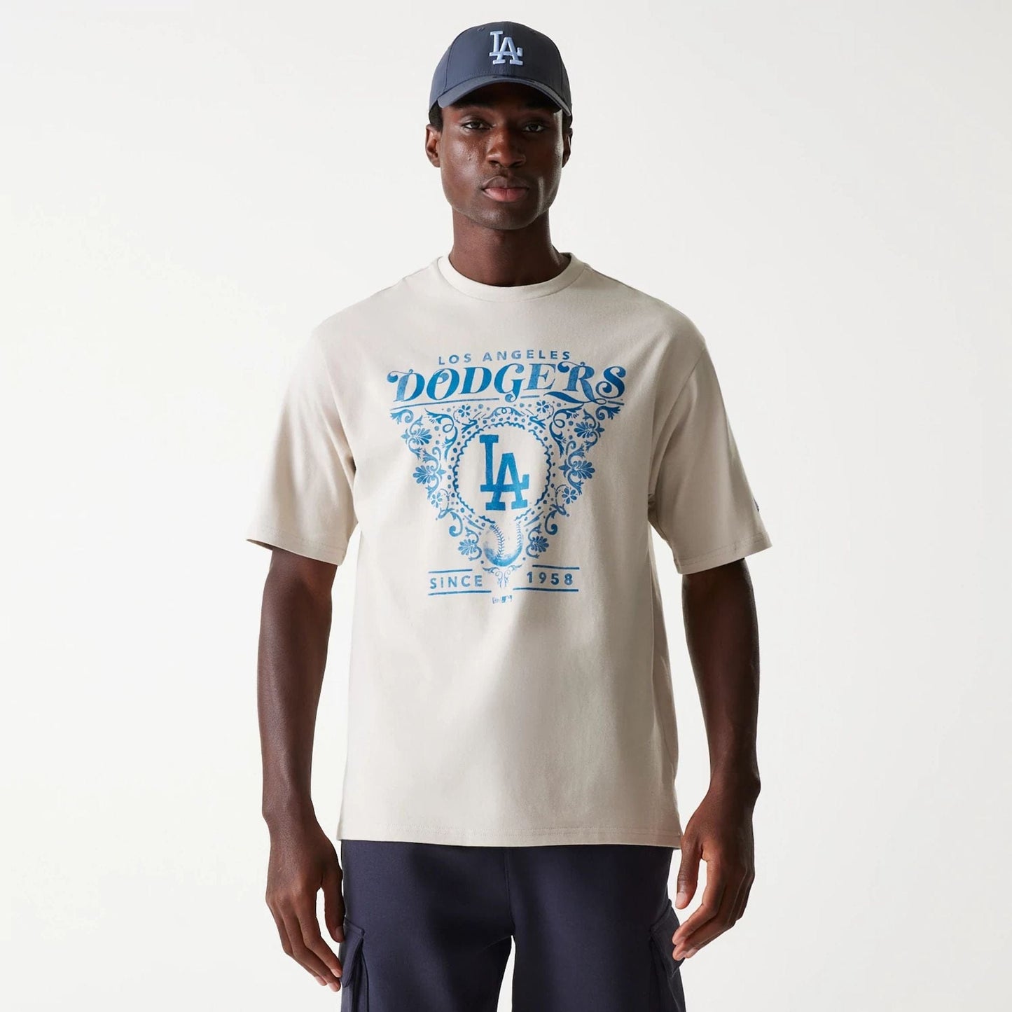 The Male model is wearing LA Dodgers MLB Floral Graphic Cream Oversized T-Shirt 1