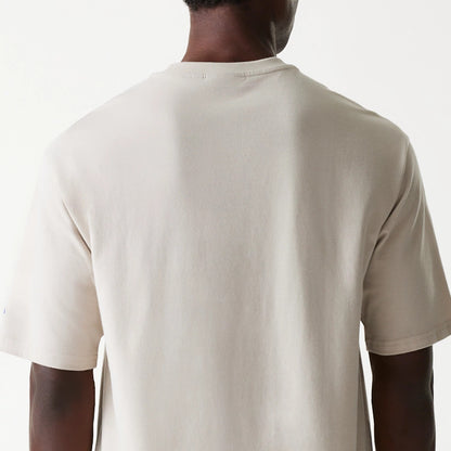 New Era LA Dodgers MLB Floral Graphic Cream Oversized T-Shirt, rear view showing a plain cream back with short sleeves, a rounded neck, and a small embroidered detail on the left sleeve.