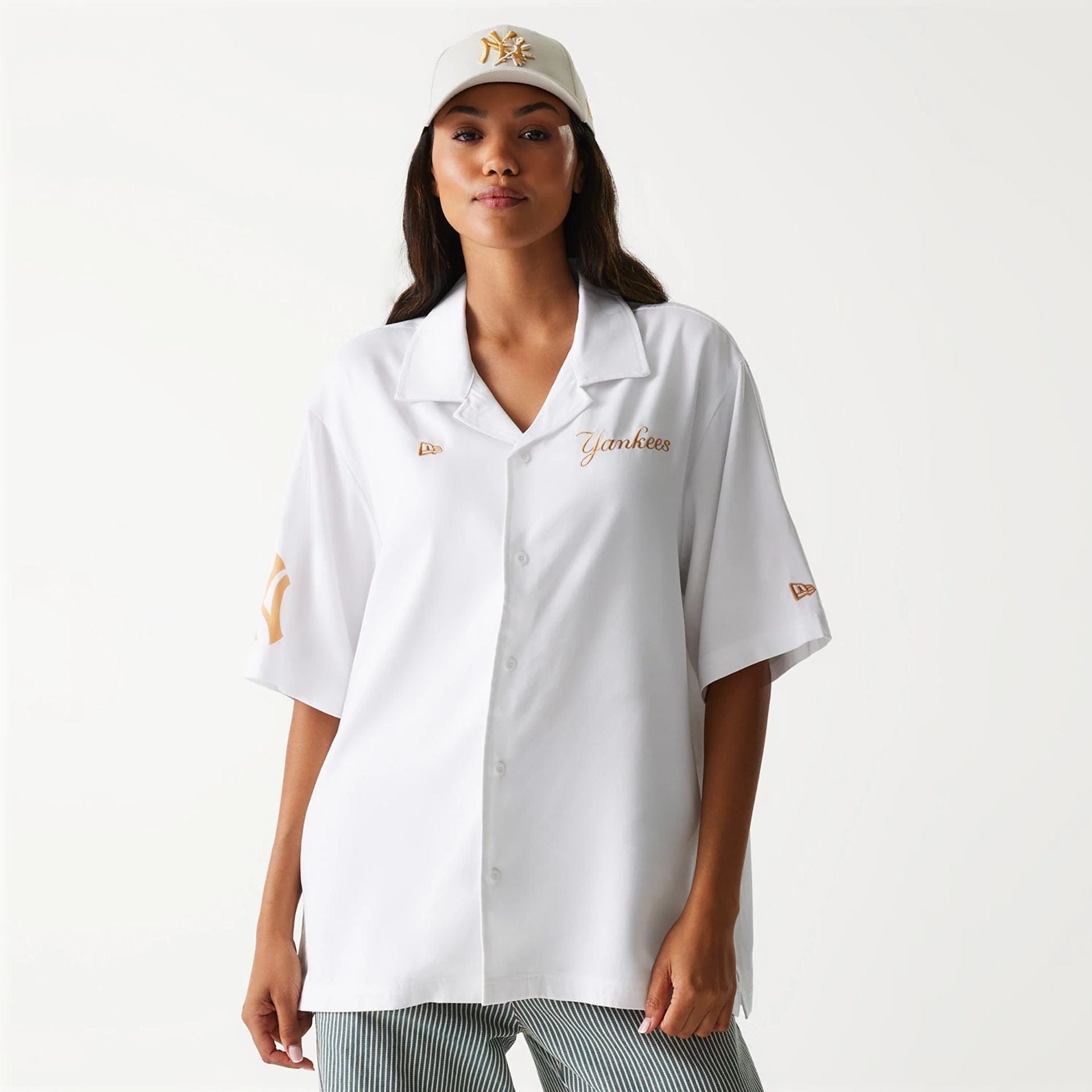 The Male model is wearing New York Yankees MLB Graphic White Revere Short Sleeve Shirt 4