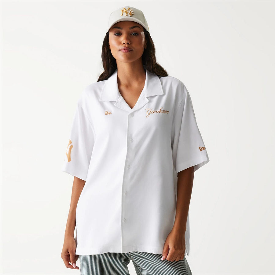 The Male model is wearing New York Yankees MLB Graphic White Revere Short Sleeve Shirt 4