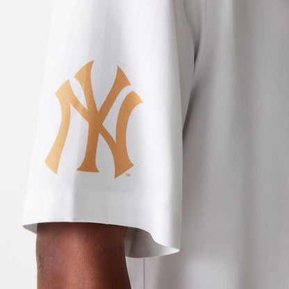 The Male model is wearing New York Yankees MLB Graphic White Revere Short Sleeve Shirt 8