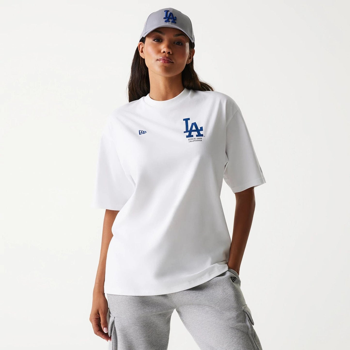 The Male model is wearing LA Dodgers MLB Baseball Graphic White Oversized T-Shirt 4
