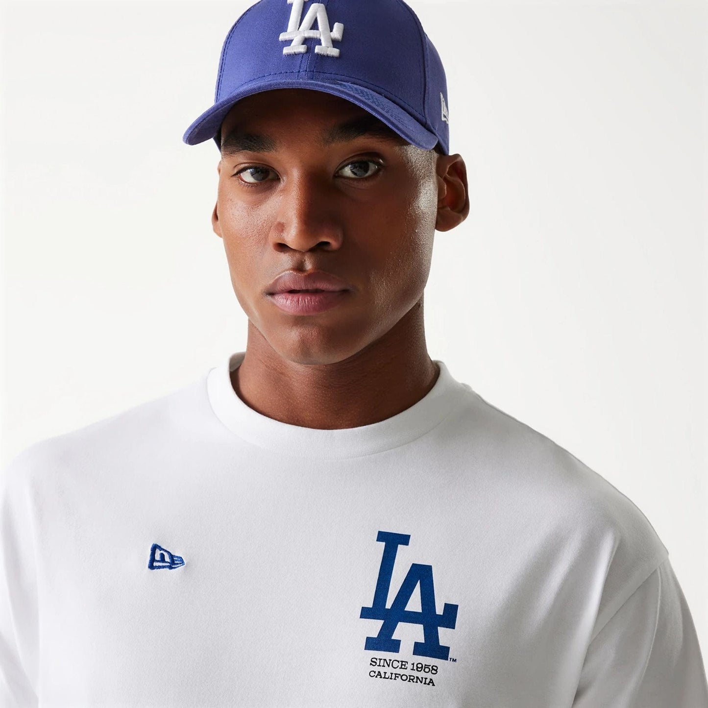 The Male model is wearing LA Dodgers MLB Baseball Graphic White Oversized T-Shirt 6