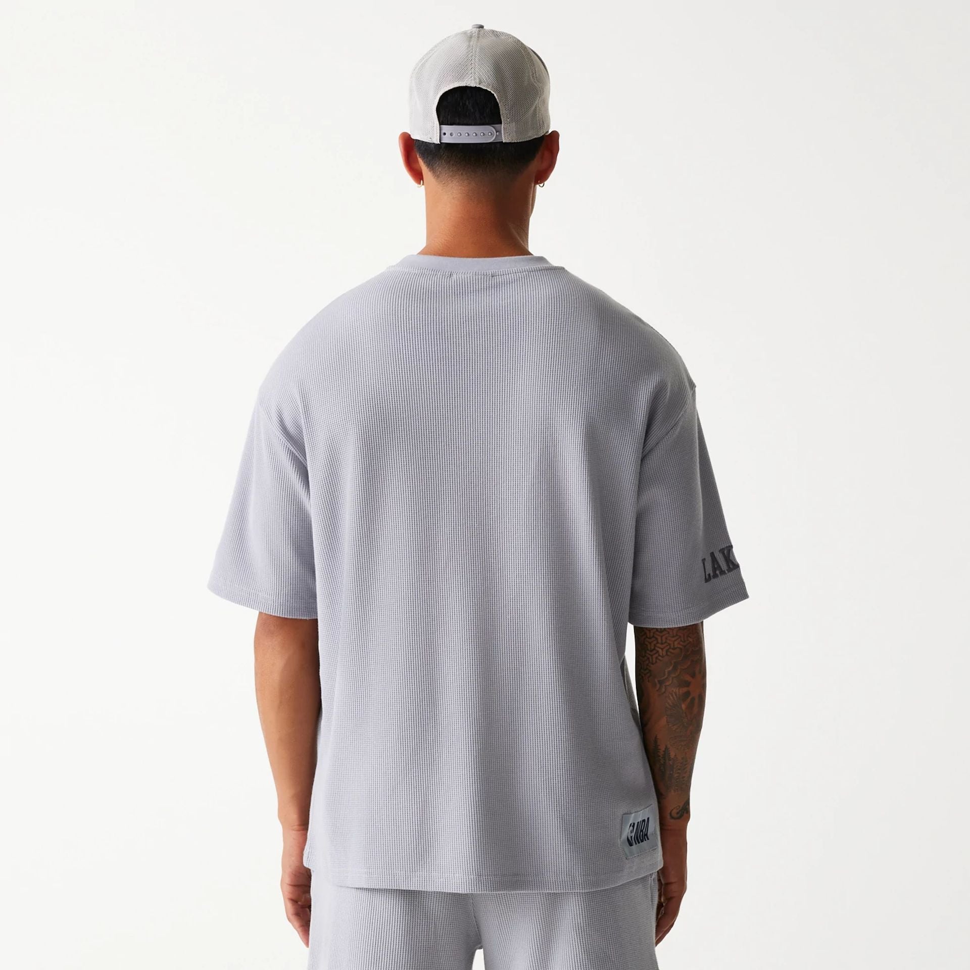 The Male model is wearing LA Lakers NBA Waffle Grey Oversized T-Shirt 2